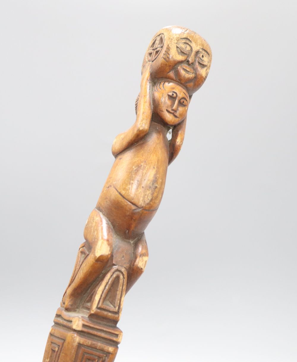 A carved fertility stick, c.1840, length 79cm